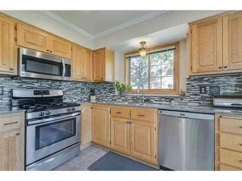 oak cabinets stainless steel appliances|kitchen remodels with oak cabinets.